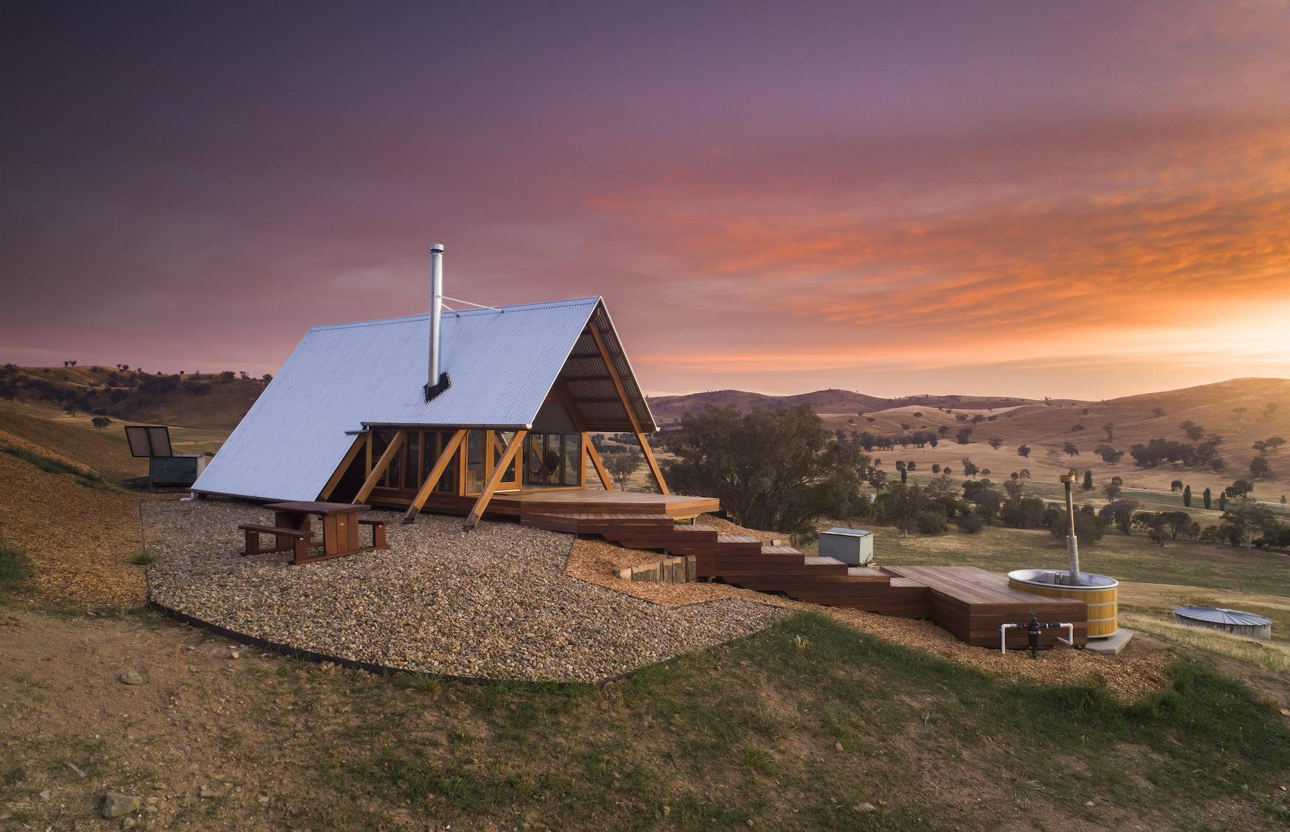 <p>Overlooking a 7,000-acre historic working sheep and cattle farm in rural New South Wales, these are <a href="https://www.kimoestate.com/accommodation-gundagai/">shepherd’s huts with a difference</a>. Exquisitely made using local timber, the double-bed spaces are sleek yet cozy with wood-burning stoves, wood-fired hot tubs, outside kitchens with barbecues and camp stoves, and wraparound views of the estate and the Murrambidgee River flat. Sweeneys (pictured) is the highest of the three properties, which are set well apart to ensure complete privacy.</p>