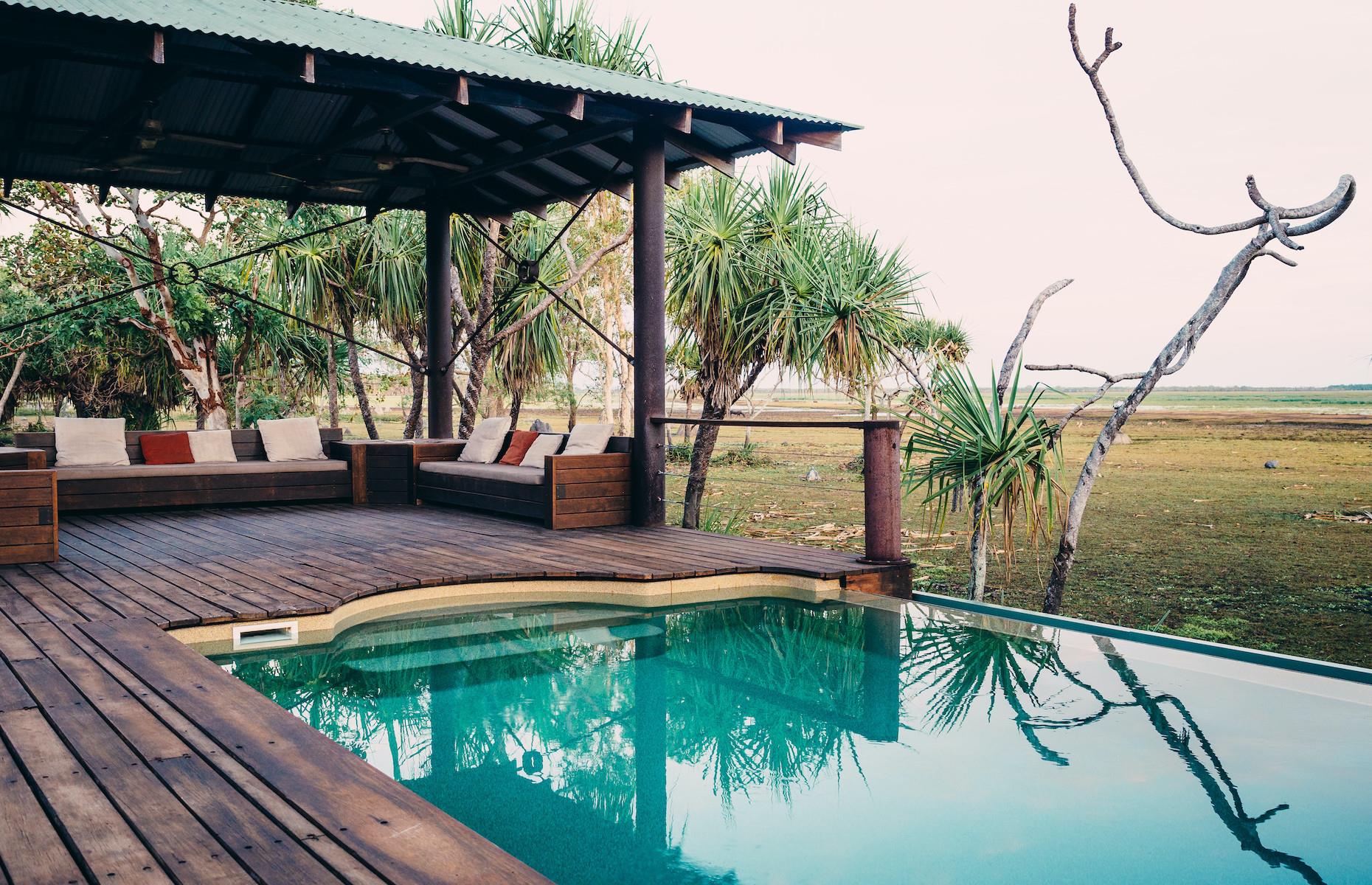 <p>A water buffalo farm in the steamy tropical wetlands of the Northern Territory may not scream luxury but <a href="https://www.bamurruplains.com/bamurru-plains-lodge/">Bamurru Plains</a> is just that. A high-end safari-style camp run by the Wild Bush Luxury group, it has 10 gorgeous bungalow tents where guests can luxuriate and immerse themselves in one of Australia’s most remote areas. Days can be spent poolside or zipping about the wetlands on airboats, spotting crocodiles and birds or fishing. You can also head off on a helicopter flight into Arnhem Land to marvel at age-old rock art. </p>
