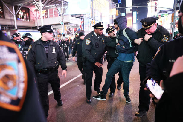 NYPD officers arrest a demonstrator as people protest the death of Tyre Nichols on January 27, 2023 in New York City. The release of a video depicting the fatal beating of Nichols, a 29-year-old Black man, sparked protests in NYC and other cities throughout the country. Nichols was violently beaten for three minutes and killed by Memphis police officers earlier this month after a traffic stop. Five Black Memphis Police officers have been fired after an internal investigation found them to be “directly responsible” for the beating and have been charged with “second-degree murder, aggravated assault, two charges of aggravated kidnapping, two charges of official misconduct and one charge of official oppression.”