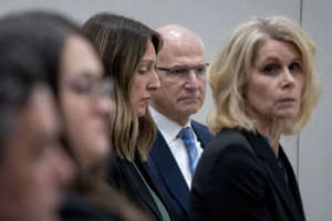 Dr. Caitlin Bernard, third from right, waiting with her attorneys Thursday before a hearing with the state medical board in Indianapolis. ((Mykal McEldowney / Indianapolis Star))