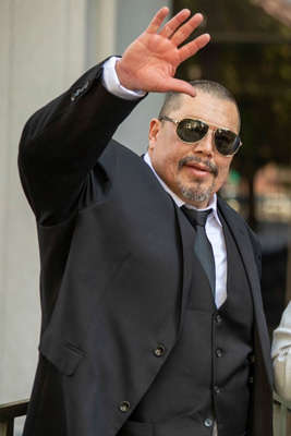 In this undated photo provided the by Los Angeles District Attorney's Office, Daniel Saldana waves. Saldana, who spent 33 years in California prison for attempted murder, has been declared innocent and freed. Los Angeles County District Attorney's Office via AP