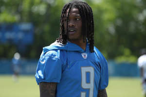 Lions wide receiver Jameson Williams walks off the field after OTAs.