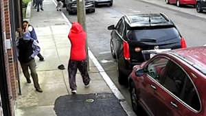 Surveillance video shows a shooting break out on Shawmut Avenue in Boston's Roxbury neighborhood on May 25, 2023.