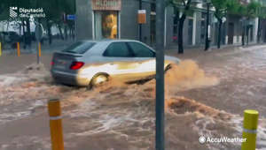 Torrential downpour floods Spanish streets