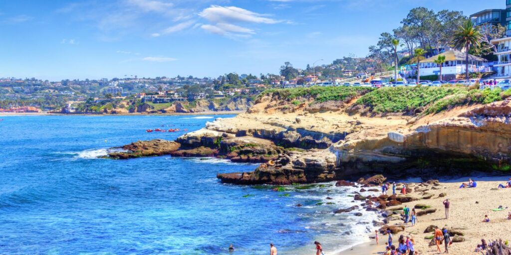 <p>Known for its affluent coastal charm, beaches, shops, and restaurants, <a href="https://www.sandiego.org/explore/things-to-do/beaches-bays/la-jolla.aspx" rel="noreferrer noopener nofollow">La Jolla</a> is a popular neighborhood stretching 7 miles of coastline. Stroll along the picturesque La Jolla Cove, where you can witness breathtaking ocean views and even spot seals and sea lions basking in the sun, then kayak or scuba dive into the calm waters of the La Jolla Shores. </p> <p>Delve into the art world at the Museum of Contemporary Art San Diego, or indulge in a little retail therapy along Girard Avenue and Prospect Street, home to boutique shops, art galleries, and charming cafes. And if you're looking for a family-friendly activity, stop by the Birch Aquarium at Scripps Institution of Oceanography, where you can explore the ocean’s wonders. </p>