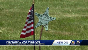 Local veteran places flags at gravesites in remembrance of Memorial Day