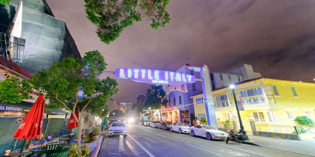 <p><a href="https://www.littleitalysd.com/" rel="noreferrer noopener nofollow">San Diego’s Little Italy</a> has a rich history that dates back to the late 19th century when Italian immigrants began settling in the area. Initially, it served as a fishing village, and over the years, it transformed into a charming community with Italian markets, restaurants, and businesses, preserving its cultural heritage and becoming a beloved neighborhood in San Diego.</p> <p>Experience the lively energy of the Little Italy Mercato, a popular weekly farmer’s market. Browse stalls offering fresh produce, artisanal products, and flowers while listening to live music and sampling delicious food. Treat yourself to an exquisite culinary journey at the neighborhood’s authentic Italian restaurants. From cozy trattorias to upscale dining, you can savor Italian flavors like handmade pasta, wood-fired pizzas, and decadent desserts. </p> <p>Explore the unique boutique and specialty stores, from boutiques to artisanal craft shops and gourmet food stores. Then discover the local art scene by visiting the numerous galleries and studios scattered throughout Little Italy. But before you leave, don't forget to stop for gelato or a coffee!</p>