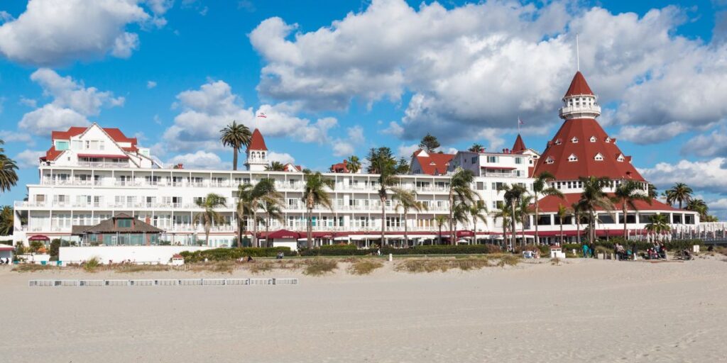 <p>Hotel del Coronado, a <a href="https://wanderwithalex.com/famous-landmarks-around-the-world/">historic landmark</a> in San Diego, has a rich and storied history dating back to its opening in 1888. It was one of the world’s largest resort hotels at that time and has hosted numerous notable guests, including presidents, royalty, and celebrities. The iconic hotel even served as the backdrop for the classic romantic comedy “Some Like It Hot” (1959), starring Marilyn Monroe. </p> <p>Today, <a href="https://hoteldel.com/" rel="noreferrer noopener nofollow">Hotel del Coronado</a> continues to host guests, but if you're only interested in visiting, historic, haunted, and self-guided audio tours are available. You can admire Victorian architecture, enjoy a meal, visit boutique shops, or enjoy Coronado Beach. Pro tip: skip the car and take the ferry to Coronado. It's only a few bucks each way!</p>