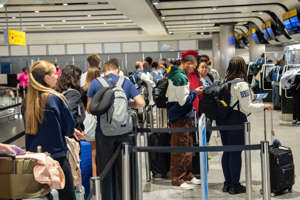 Passengers queueing at Heathrow
