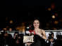 Turkish actress Merve Dizdar poses during after she won the Best Actress Prize. AFP