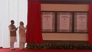PM Modi unveils plaque to mark inauguration of new Parliament building | Watch