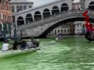 Water in Venice turns 'highlighter green' near Rialto Bridge