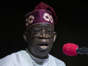 FILE- President-Elect Bola Tinubu addresses gathered supporters and the country after receiving his certificate at a ceremony in Abuja, Nigeria Wednesday, March 1, 2023. Nigeria's Bola Tinubu will take over the reins in Africa's most populous country at a period of unprecedented challenges, leaving some citizens hopeful for a better life and others sceptical that his government would perform better than the outgoing one on Monday May 29, 2023. (AP Photo/Ben Curtis, File) ((Ben Curtis / Associated Press))