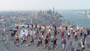 New Yorkers practice yoga on top of 100-storey skyscraper in Manhattan