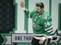 Dallas Stars left wing Jamie Benn waves during a ceremony honoring his 1000th NHL game before an NHL hockey game against the Colorado Avalanche at the American Airlines Center on Saturday, March 4, 2023, in Dallas.