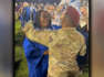 Soldier surprises sister at high school graduation ceremony