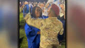 Soldier surprises sister at high school graduation ceremony