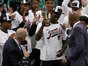 Miami Heat forward Jimmy Butler (22) celebrates with the MVP trophy after the Heat defeated the Boston Celtics in Game 7 of the Eastern Conference Finals for the 2023 NBA playoffs at TD Garden.