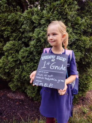 Aimee Beall, then 6, poses on her first day of first grade in 2021.