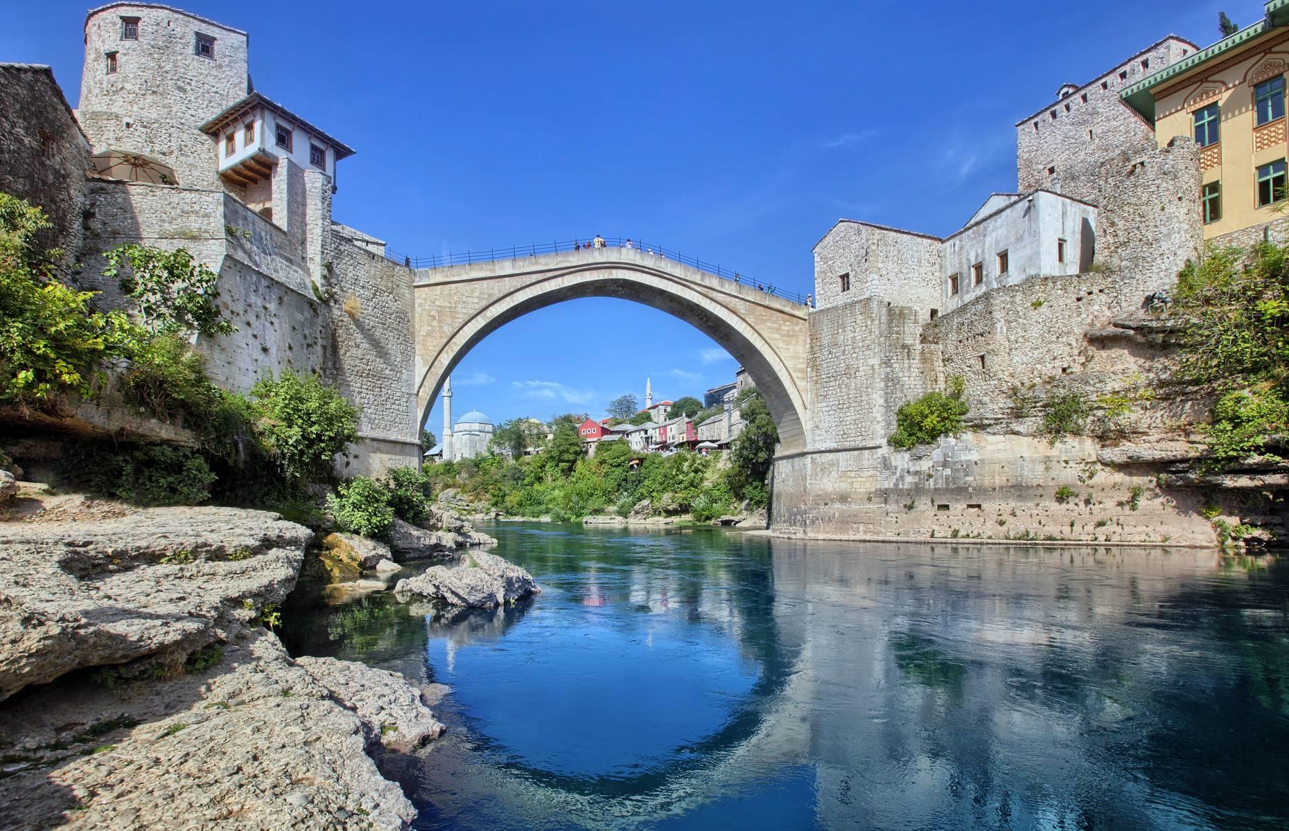The word Most means bridge in Slavic languages and this town is named after its most famous feature, a bridge that spans the river Neretva. Mostar began as a trading town between the Adriatic coast and central Bosnia in medieval times – the pedestrian bridge was then made of wood, but was rebuilt in stone in 1468 when the town came under the rule of the Ottoman Empire. Tragically, the 400-year-old bridge was destroyed during the Bosnian war in the 1990s, but has since been reconstructed.