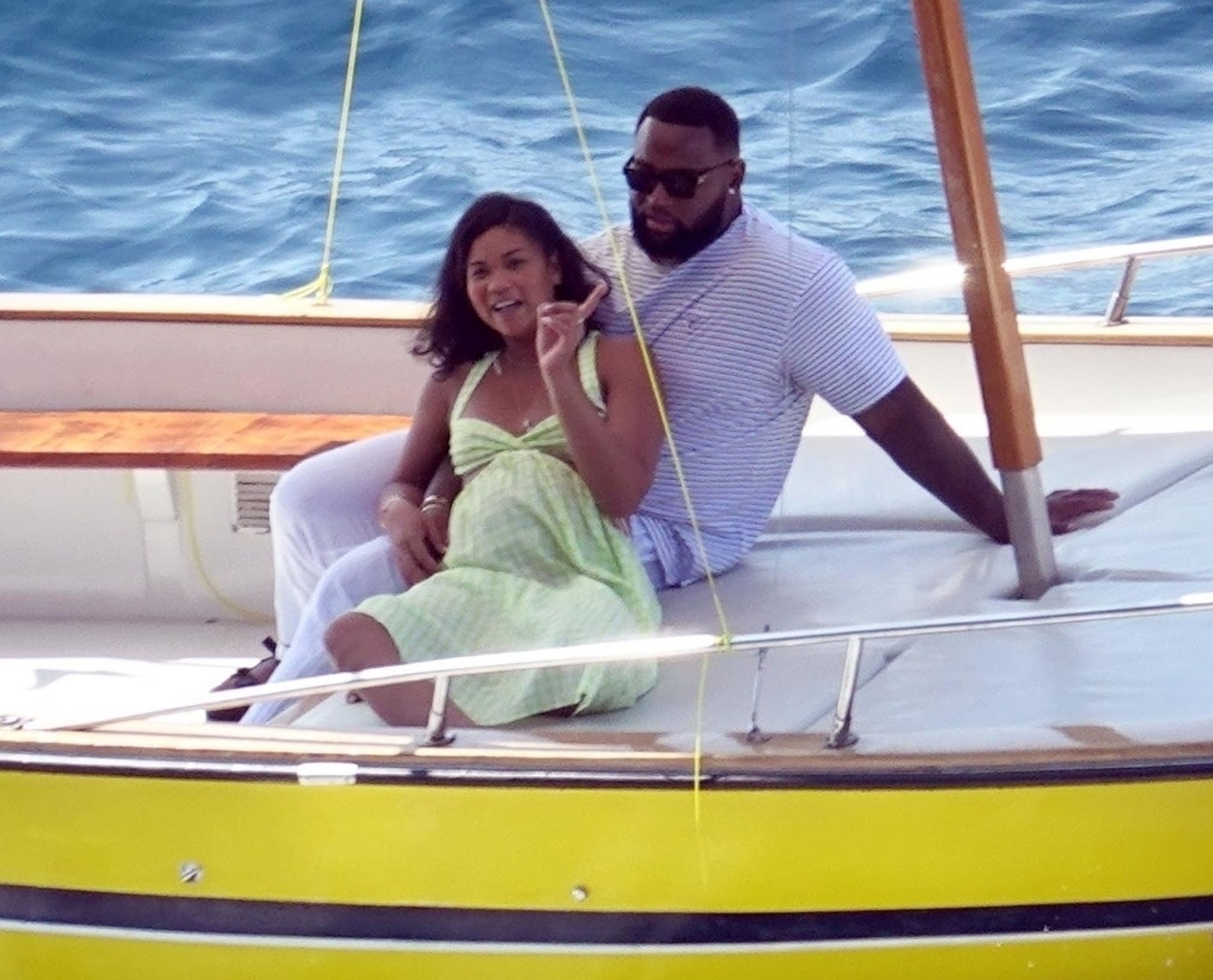 <p>New England Patriots player Davon Godchaux and his pregnant fiancée, model Chanel Iman, enjoyed a romantic boat ride in the Italian sunshine during a vacation in Capri, Italy, on May 28.</p>