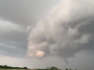 Grey storm clouds fill the sky near Hartney, Manitoba