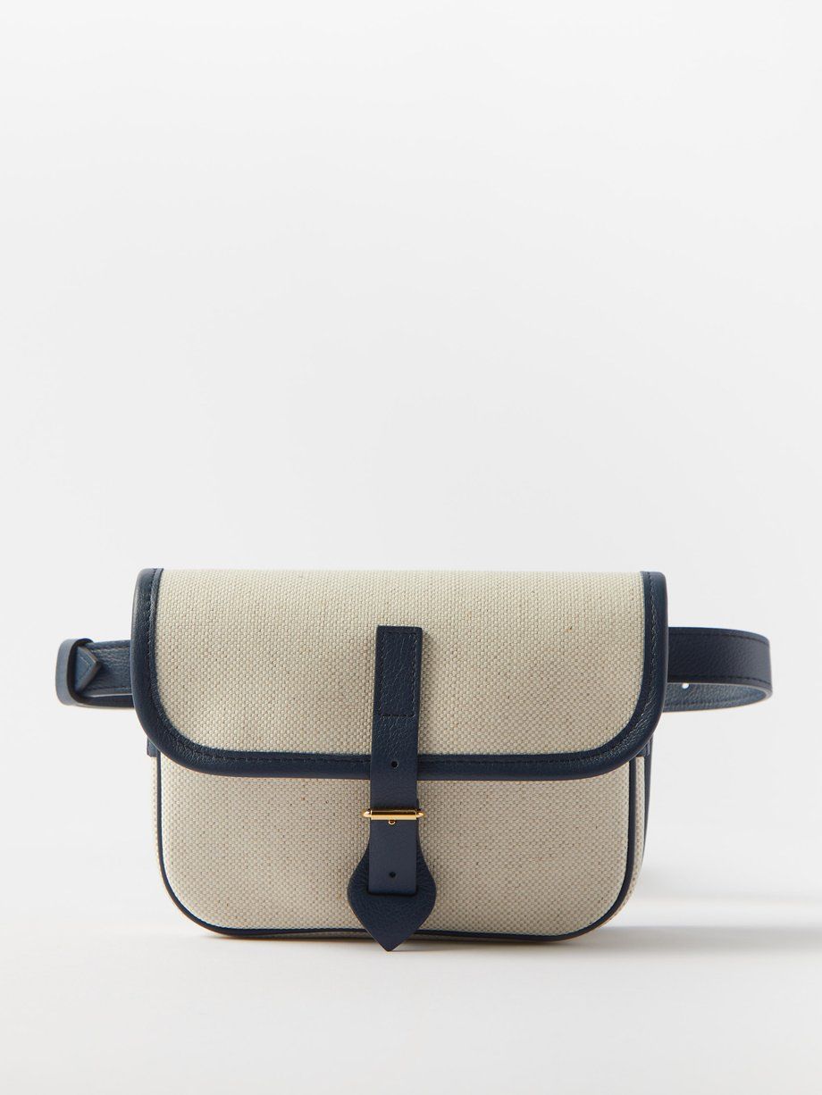 <p><strong>$407.00</strong></p><p>Go hands free with this belt bag inspired by a riding satchel. Made from woven canvas, the material is water-repellent with anti-stain properties. The overall design has a classic feel, thanks to clean piping and a minimalist buckle clasp. Supremely versatile, this L/Uniform No. 25 belt bag can be carried two ways, across the body or as a true belt bag. </p><p><strong>Size:</strong> 7.3 "W x 5.1 "L x 2 "D. 63.7" max strap length. </p><p><strong>Material: </strong>63% cotton, 37% linen</p><p><strong>Colors:</strong> Beige </p>