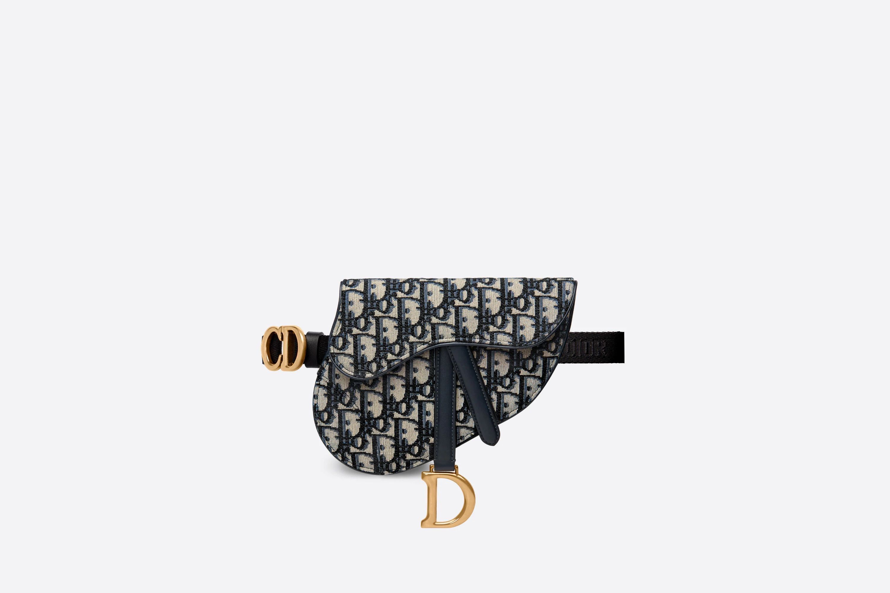 <p><strong>$2000.00</strong></p><p>The Saddle bag from Dior was <em>the</em> It-bag of the early 2000s, and this belt bag version of it still feels totally modern. The organic pouch shape is hung around an adjustable belt, and trimmed with all the same details as the original bag, such as the front'D' stirrup and 'CD' metal letters. If you are a minimalist, wear as a standalone, statement piece against a neutral palette, or if you want to have a little more fun, mix and match with a brighter ensemble. </p><p><strong>Size:</strong> 8 x 6.5 x 1 inches</p><p><strong>Material:</strong> Jacquard, Leather </p><p><strong>Color:</strong> Blue Dior Oblique Jacquard</p>
