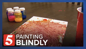 He's a blind boy painting with a purpose. This is what he is raising money to do.