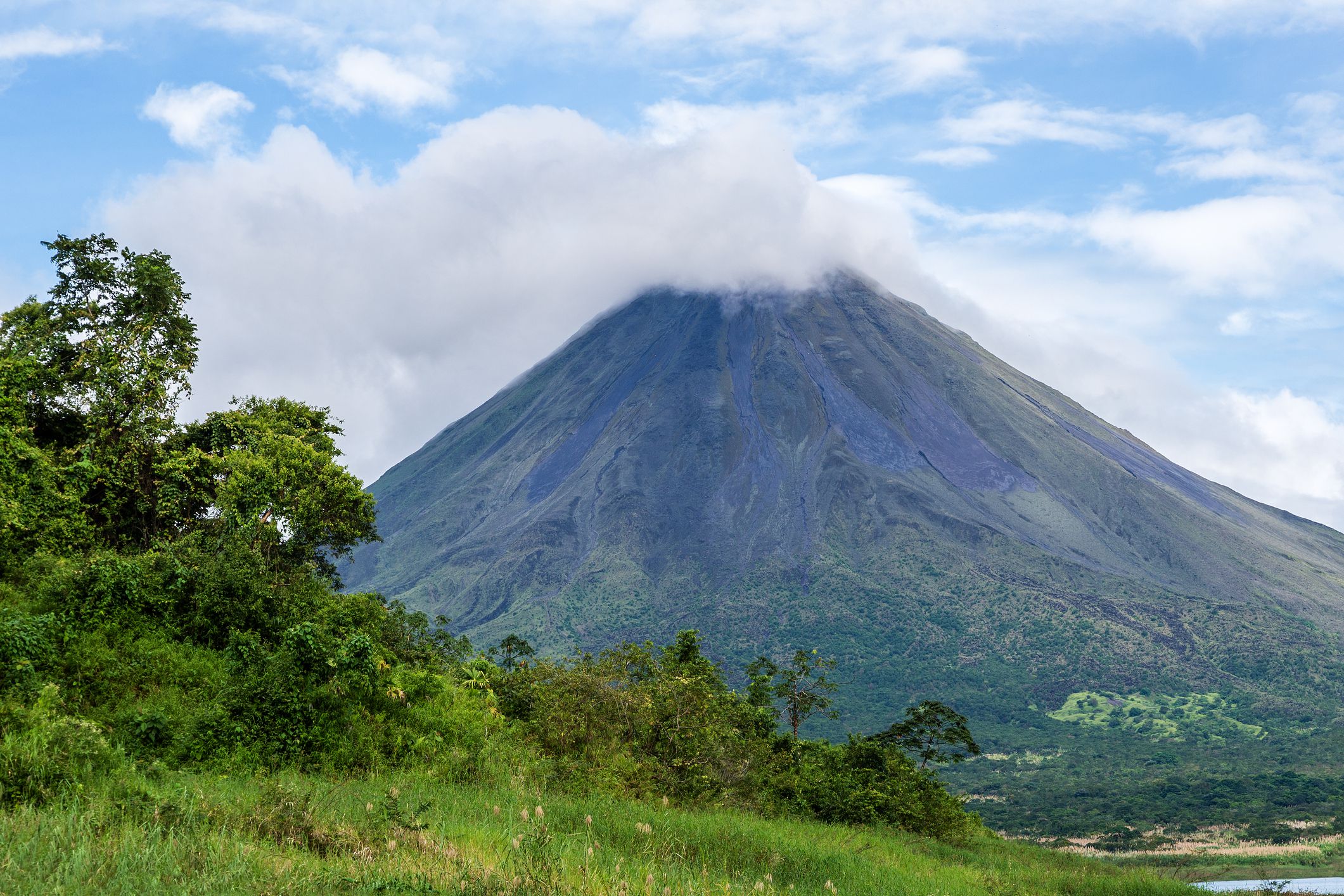 <p>Located near La Fortuna, Arenal Volcano is an active volcano in Costa Rica. While it hasn’t had a major eruption since 1968, it still has frequent, minor eruptions that visitors can safely view and appreciate. Because of this, it’s one of the most unique things to do in Costa Rica.</p><p>Visitors should also consider spending time in the town of La Fortuna. While it provides great views of Arenal Volcano, there are also numerous restaurants and attractions to explore.</p>