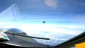 Video shows Chinese fighter jet flying in front of US military plane