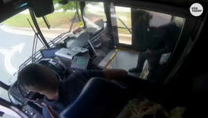 Terrifying video shows violent shootout between a bus driver and passenger on a public bus
