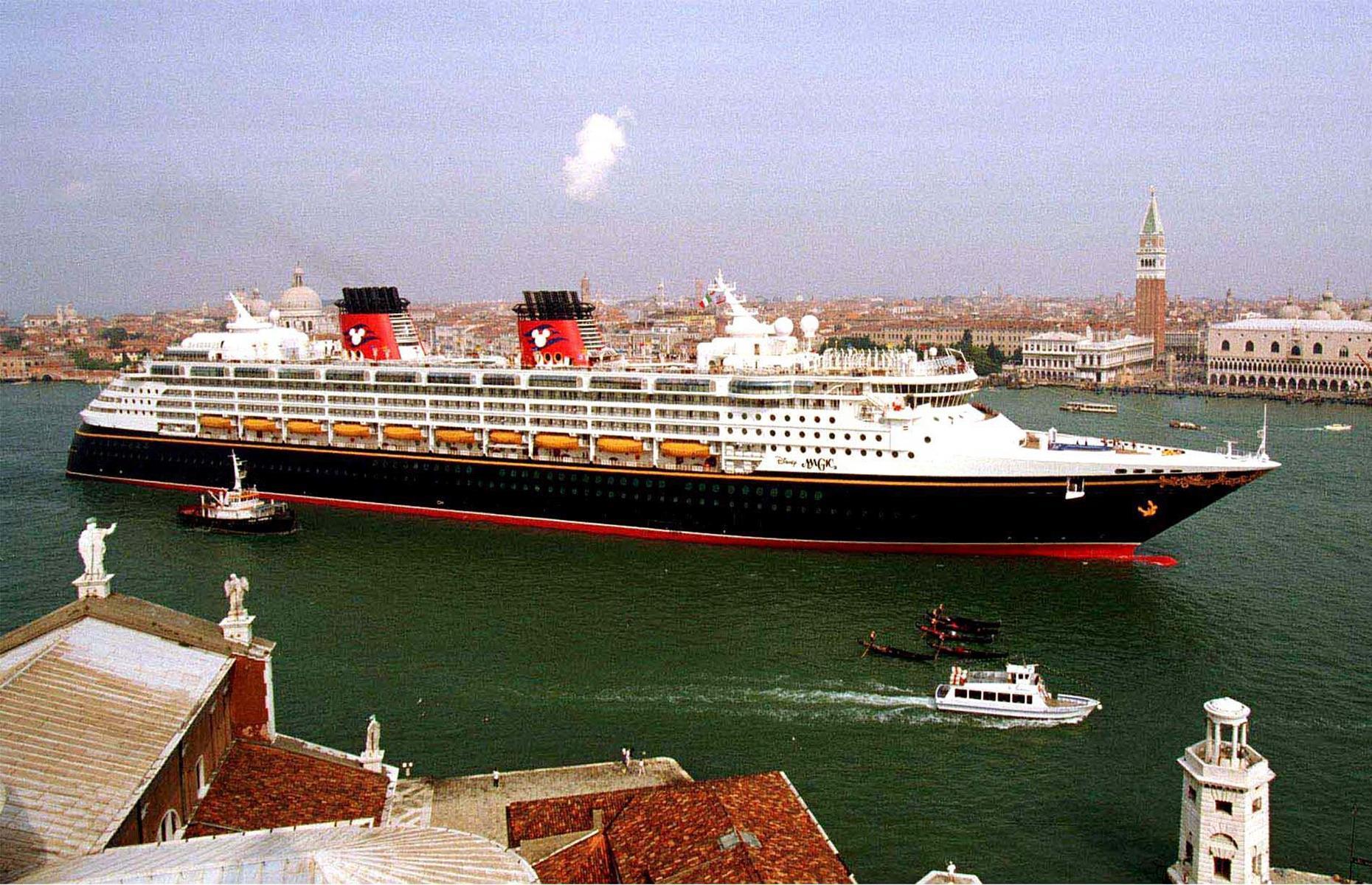 By the 1990s Disney was spreading a little magic at sea. Disney Magic, a bold ship with black, yellow and red detailing à la Mickey Mouse, made its maiden voyage in 1998. It's pictured here that same year, cruising through Venice, and is still sailing today, complete with a spa, pools and plenty of shops and themed dining rooms.