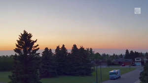 A hazy sunset ends the day in Red Deer