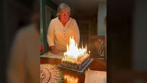 Grandma's birthday cake set off the fire alarm as she struggles to blow out the candles