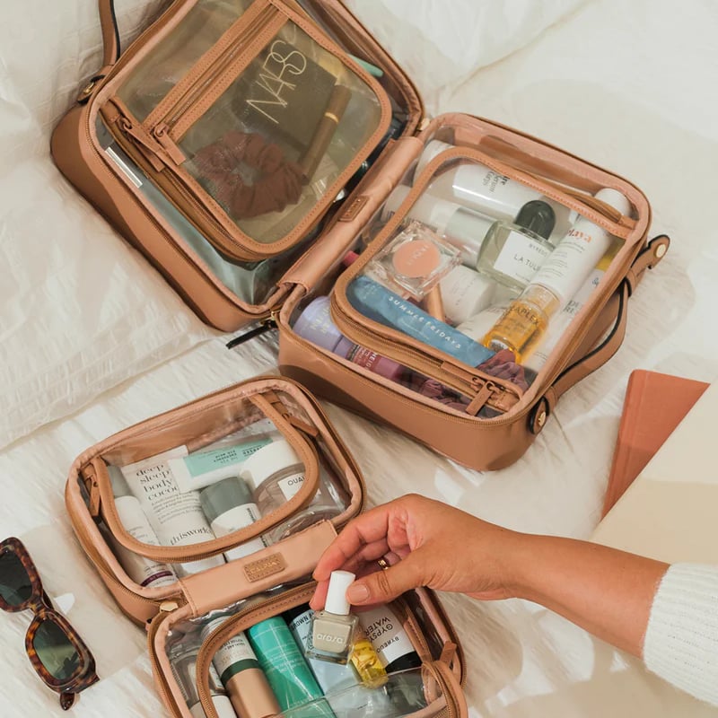 <p><a href="https://www.ulta.com/p/basics-clear-train-case-pimprod2010113?sku=2550301">BUY NOW</a></p><p>$14</p><p>Vacation season is in full swing, and when it comes to packing efficiently and in style, we got you covered. Whether you're going on a two-week global adventure or a quick weekend getaway, knowing what to pack and how to pack it is truly a challenge, especially if you're prone to overdoing it. From the <a href="https://www.popsugar.com/smart-living/best-carry-on-luggage-46162008" class="ga-track">best carry-on suitcases</a> to the most <a href="https://www.popsugar.com/smart-living/best-personal-item-carry-on-bags-flying-48891209" class="ga-track">useful personal-item bags</a> that can store it all and fit underneath your seat, we found the best of the best when it comes to <a href="https://www.popsugar.com/smart-living/best-travel-accessories-must-haves-49060204" class="ga-track">travel essentials</a>. But, the one thing that often gets overlooked is a travel makeup bag. We know there are plenty of options to choose from, and that's why we narrowed it down to the top 10 picks that prioritize organization, durability, and of course, style. </p> <p>To truly help you cut the clutter and pack efficiently, we rounded up the best travel makeup bags on the market. These smart choices will help you store all your beauty essentials, including your must-have skin-care picks, go-to hair products, and all your makeup, including a few extras. Some of these travel makeup bags prioritize depth so you can store everything upright; other options let you hang the bag, so you can keep your counters cleared off and see everything you packed. Plus, we found a few that are also clear and TSA-compliant. There's no doubt you'll find your match, so shop our top picks ahead. </p> <p align="right">- <em>Additional reporting by Krista Jones</em></p>