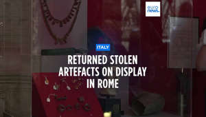 Hundreds of stolen artefacts - including an Etruscan three-legged table made of bronze and marble busts of men from the imperial age - have been returned to Italy after they were discovered in the UK.