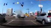 Watch a falling missile fragment nearly miss a car in Kyiv