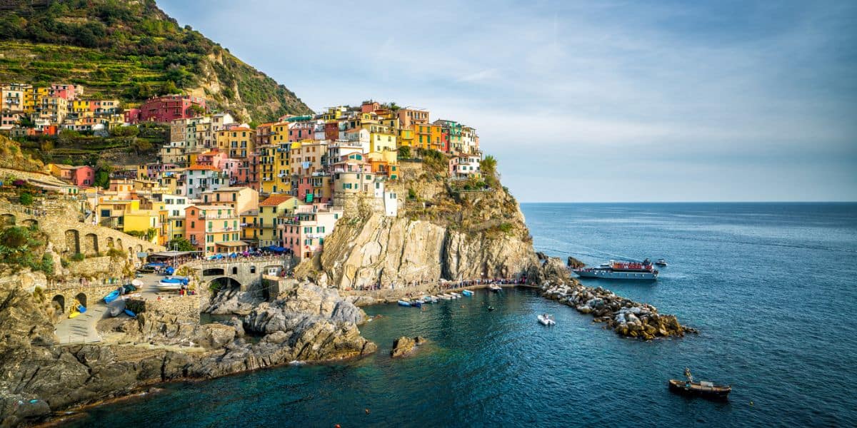 Northern Italy is known for its mountain ranges, beautiful coastlines, rich cuisine, deep history, and gorgeous architecture. [Affiliate Links]