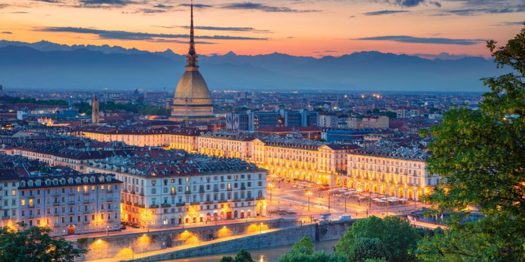 <p><em>Recommended by Teresa of T as Travel</em></p> <p>The first capital of the Kingdom of Italy from 1861 to 1865, Present day Turin is an amazing city. Turin, located in Northern Italy, is a combination of various European styles and modernity that must be added to your bucket list. In the past, Turin was famous as the house of the Italian monarchy; meanwhile, today, it is famous for industries such as FIAT and many others.</p> <p>The Chapel of the Holy Shroud is a really important cathedral, famous for being the house of the Holy Shroud. It is the Pope that decides when to expose the Holy Shroud, and usually, the expositions last for 45 days.</p> <p>The most important and principal square of Turin is San Carlo Square. The square is very nice and elegant with at the end two twin churches, in the middle the Equestrian monument wanted by the leader of the Savoy dynasty, and all-around beautiful arcades with historical and chic cafes.</p> <p>If you are looking for a breathtaking view and a splendid church, you need to go and visit the Basilica of Superga.</p> <p>The Egyptian Museum is the house of the biggest collections of Egyptian antiquities. The museum was founded in 1894 by King Carlo Felice di Savoia and grew more during the years.</p> <p>The symbol of Turin is absolutely the Mole Antoneliana. From the top of it, you can have a 360 view while inside there is a stunning and interesting museum of the cinema.</p> <p>UNESCO World Heritage, the Reggia di Venaria, is a beautiful day trip not too far away from Turin. You can spend a full day wandering inside rooms and the beautiful gardens of the palace.<br>Like all of Italy, Turin is known for its delicious food. Find a traditional restaurant and try the Agnolotti or the Vitello Tonnato, all accompanied by wine.</p>