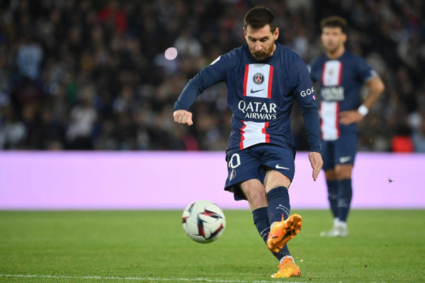 Paris Saint-Germain's Argentine forward Lionel Messi kicks a free kick during the French L1 football match between Paris Saint-Germain (PSG) and Ajaccio at the Parc des Princes in Paris, on May 13, 2023. (Photo by FRANCK FIFE / AFP)