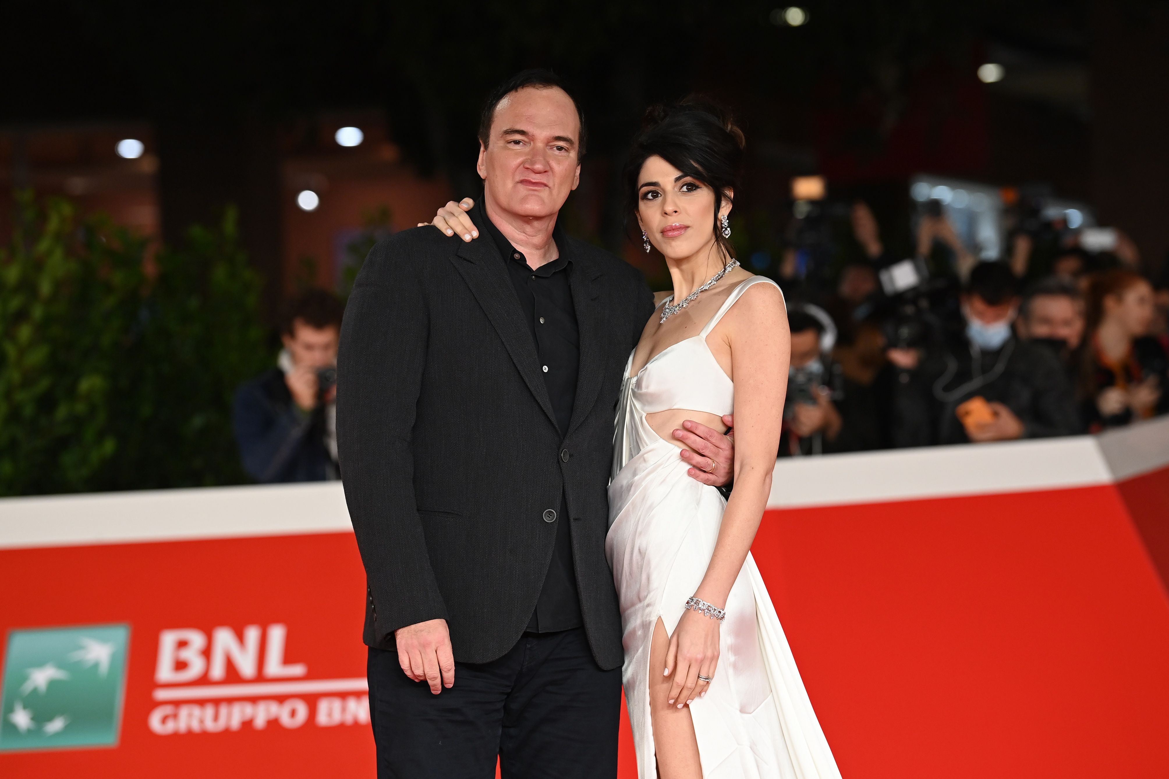 <p><span>Oscar-winning filmmaker Quentin Tarantino is more than 20 years older than wife Daniella Pick, an Israeli singer who's the daughter of Israeli pop star Svika Pick. "I was in Israel for the premiere of [my film]'Inglourious Basterds' in Tel Aviv and I met her in a club. We danced all night," Quentin later told radio host Howard Stern of their 2009 meeting, which took place when Quentin was 46 and Daniella was 25. They went their separate ways and reconnected about seven years later. Then married in 2018 and have since welcomed two kids.</span></p>