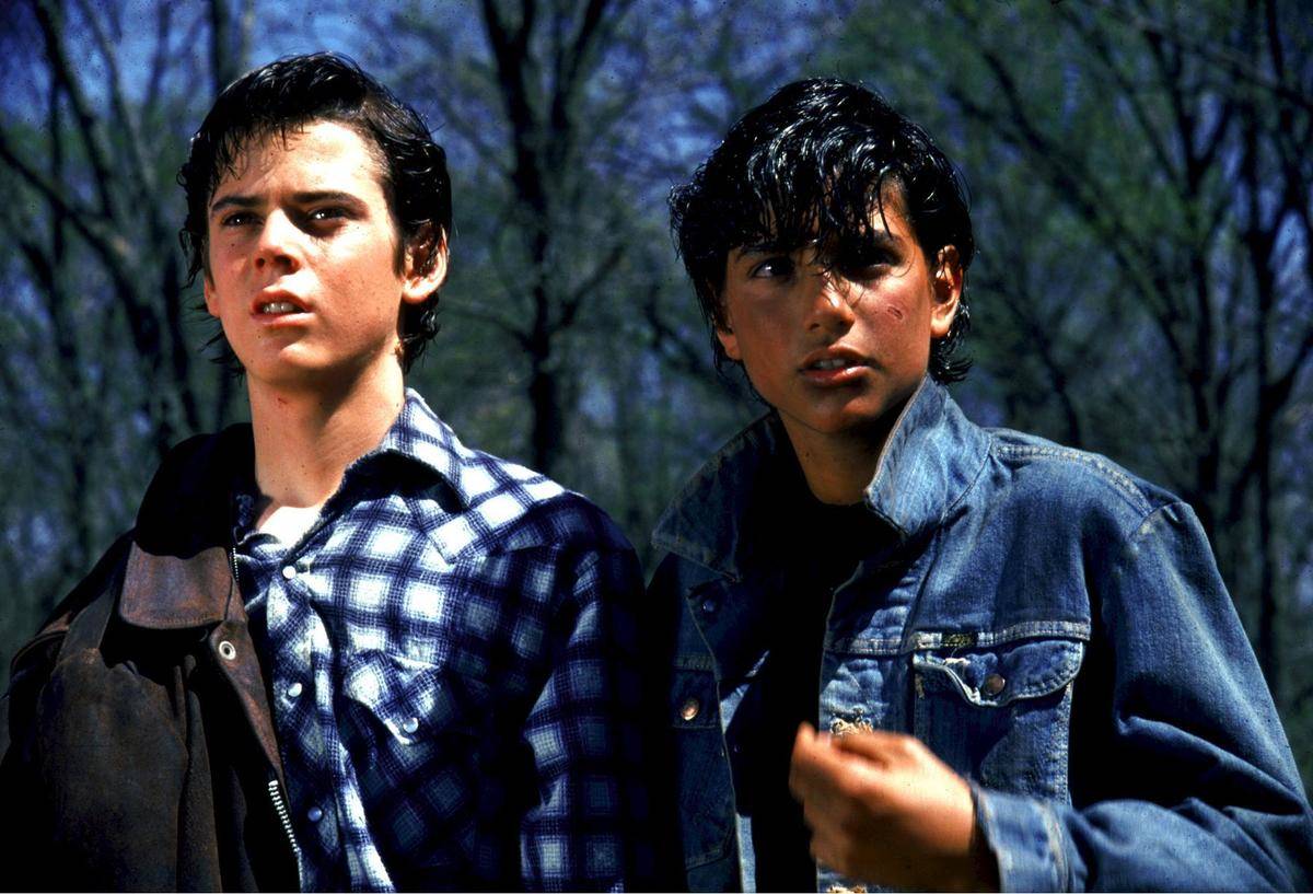 <p>One of the biggest plot points in <i>The Outsiders </i>is the class separation between the affluent and popular "Socs" and the rougher around the edges "Greasers." When the teenagers were selected to be in the film, little did any of them know that they would actually be separated into groups. </p> <p>Coppola wanted to establish a real rift between the actors which led him to divide them into their fictional social statuses, ensuring that those playing the "Socs" had better rooms, more spending money, free room service, and leather-bound scripts. </p>