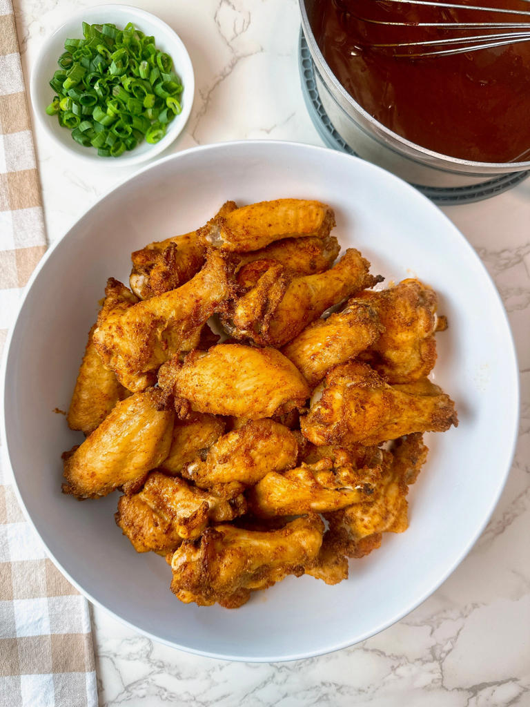 You don't need a fryer to make the crispiest BBQ chicken wings. Here's ...