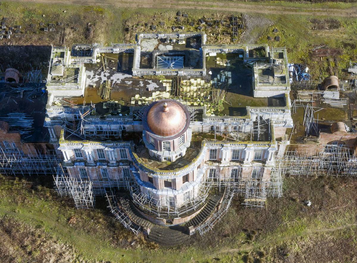 <p>A massive mansion that's been left to rot for more than three decades, Scotland's Hamilton Palace was built in all its glory in 1695. Though no one currently lives there, Hamilton Palace is Scotland's largest private home and is actually bigger than Buckingham Palace.</p>