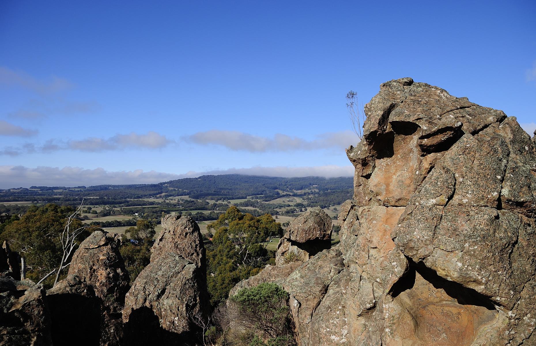 <p>Shrouded in mystery, thanks to Joan Lindsay’s novel <em>Picnic at Hanging Rock</em>, this jagged outcrop in the Macedon Ranges is another of Australia’s intriguing geographical formations. Peppered with caves, tunnels and overhanging boulders, the distinctive rock formation was used for sacred ceremonies and initiations by the Dja Dja Wurrung, Woi Wurrung and Taungurung people, who are said to have avoided its summit believing it to be inhabited by evil spirits. But if you’re not easily spooked, the views from the top are spectacular.</p>