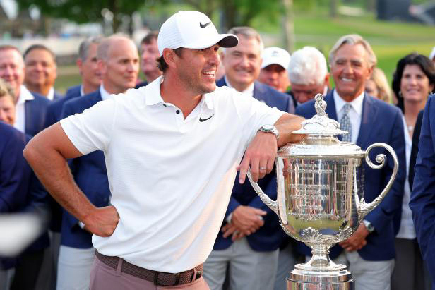 ROCHESTER, NEW YORK - MAY 21: Brooks Koepka of the United States smiles alongside the Wanamaker Trophy after winning the 2023 PGA Championship at Oak Hill Country Club on May 21, 2023 in Rochester, New York. (Photo by Kevin C. Cox/Getty Images)