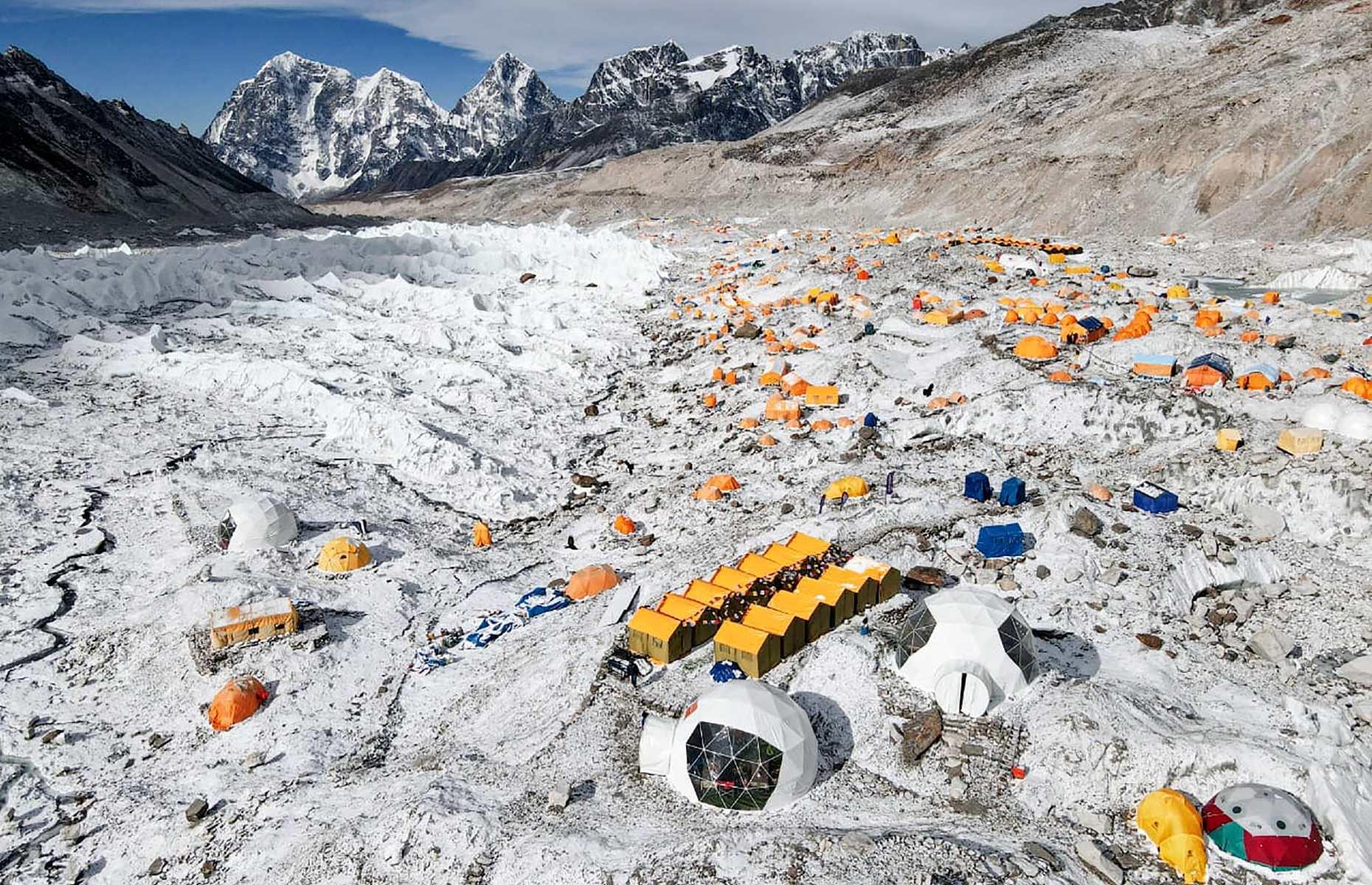 In June 2022, Nepal announced it would be moving Everest’s base camp to a lower-elevation location, as the current area is being destabilized by meltwater. The Khumbu glacier, on which the camp is located, is melting at a faster rate due to climate change, leading to crevasses opening up which are making the terrain unstable and unsafe. The landmark move will see the camp transferred from an elevation of 17,598 feet (5,364m) to an altitude around 656 feet to 1,312 feet (200-400m) lower, accordin