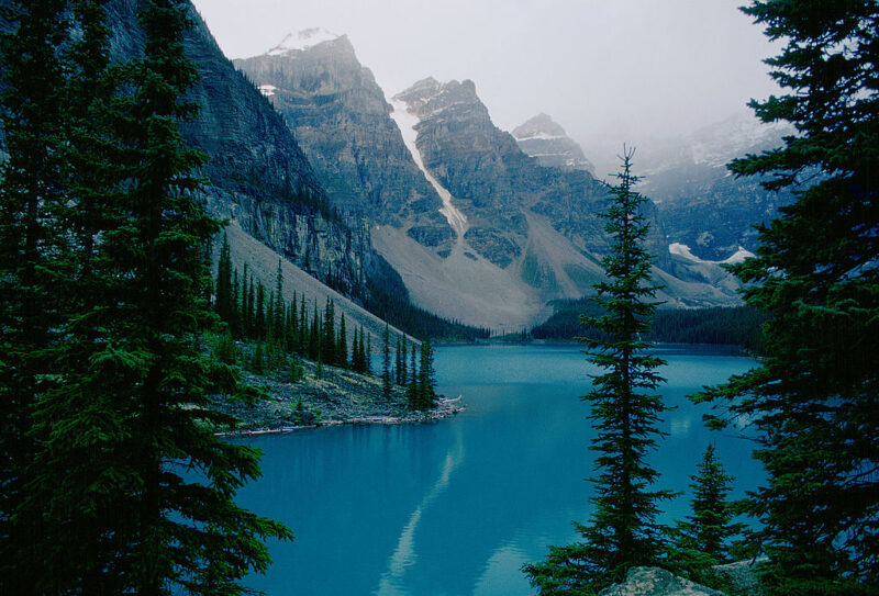 <p>Banff National Park is arguably one of the most popular tourist attractions in all of <a href="https://www.outdoorrevival.com/adventure/mount-thor.html" rel="noopener">Canada</a>. The glacier-blue waters, views of the Rocky Mountains and endless opportunities for outdoor fun (think <a href="https://www.outdoorrevival.com/adventure/beautiful-hiking-trails-america.html" rel="noopener">hiking</a> and <a href="https://www.outdoorrevival.com/instant-articles/minimal-footprint-camping-being-conscious-of-your-surroundings.html" rel="noopener">camping</a>) mean it's not hard to understand why the location in the heart of <a href="https://www.outdoorrevival.com/old-ways/beautiful-portraits-from-1910-first-nation-people-of-alberta.html" rel="noopener">Alberta</a> has fell victim to overtourism.</p> <p>Annually, <a href="https://banff.ca/252/Learn-About-Banff" rel="noopener">some four million people</a> visit Banff, bringing with them an insurmountable amount of traffic. To combat this, Parks Canada created the <a href="https://tourismtogether.ca/" rel="noopener">Tourism Together collaboration effort</a>, which identified five core principles for residents living in the area and those who visit: wildly innovative, better tomorrow, tourism together, connected by nature and lead by example.</p> <p>Among the initiatives to come from this include enacting a reservation system, providing more reliable mass transit and closing certain locations to private vehicles.</p>