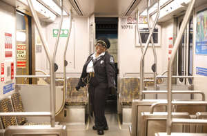 Metro train operator Glenda Murrell, who has worked for Metro since 1997, operates the train during a "sneak peek" ride on the new Regional Connector set to open soon. ((Christina House / Los Angeles Times))